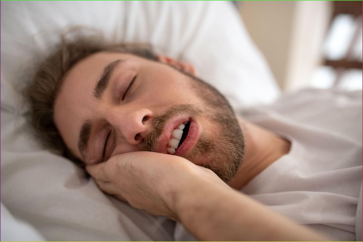Person snoring due to summer heat and humidity affecting breathing during sleep
