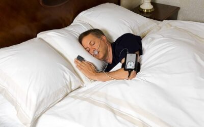 Sleep apnea patient waking up gasping for air at night due to airway collapse and snoring while sleeping on his back